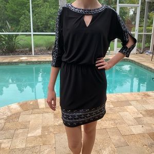 Navy blue dress with gold detailing